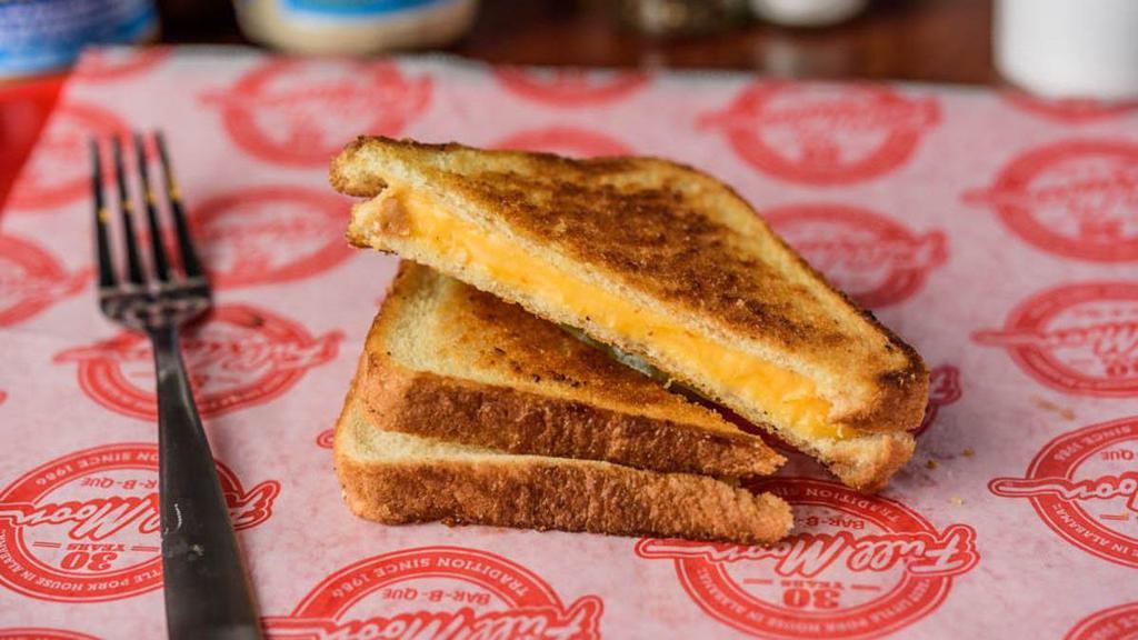 Grilled Cheese · American cheese on sliced white bread