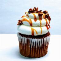 Carrot Cake · A sweet, spiced carrot cake loaded with pecans, topped with whipped cream cheese icing, driz...