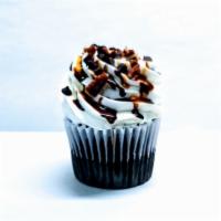 Turtle · Our chocolatey cake with vanilla buttercream, drizzled with chocolate sauce, caramel sauce &...