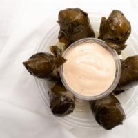 Dolmas · Five piece stuffed grape leaves with rice, tomatoes, onion, and blends of herbs and spices. ...