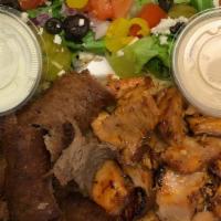 Meat Combination Plate · A choice of two meats with basmati rice Greek salad and pita bread.
the choices are: chicken...