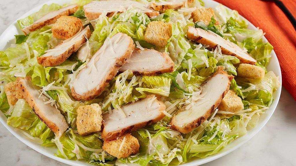 Grilled Chicken Caesar · Parmesan, croutons and Caesar dressing on romaine lettuce with Grilled Chicken.