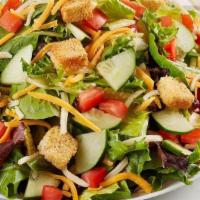 Garden Salad · Cheddar-jack, tomato, cucumber and croutons on mixed greens.