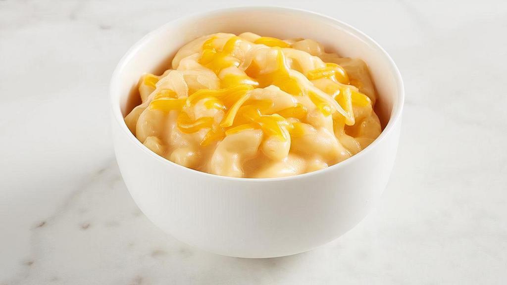 Kids Mac & Cheese · Elbow macaroni noodles with creamy cheddar, American and Neufchatel cheeses. Comes with your choice of a side and a Mini Chocolate Chip Cookie.