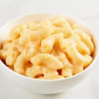 Mac & Cheese · Elbow macaroni noodles with creamy cheddar, American and Neufchatel cheese.