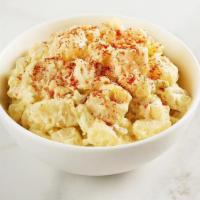 Potato Salad · Southern style potato salad with chunks of potatoes blanketed with our creamy mustard and eg...