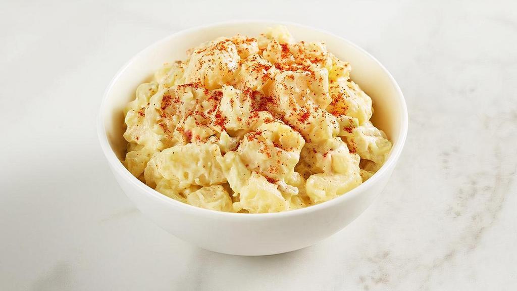 Potato Salad · Southern style potato salad with chunks of potatoes blanketed with our creamy mustard and egg dressing.
