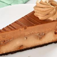 Godiva Double Chocolate Cheesecake · Rich Godiva® cheesecake baked with chunks of milk chocolate topped with chocolate mousse, ch...