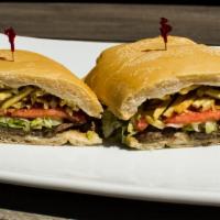Steak Sandwich · flank steak, sauteed onions, lettuce, tomato, potato sticks, with mayo on cuban bread