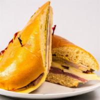 Media Noche · Ham, swiss cheese, piece of pork with mayo on potato bread