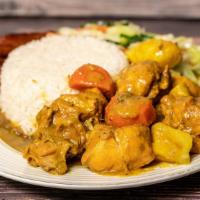 Curried Goat · 987-1315 cal.Tender chunks of curied-dad goat cooked to the bone.Includes potatoes and carro...