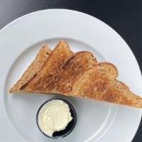 Side Of Multigrain Toast · Multigrain Toast with Butter on the Side, Choice of Sweet Sauce