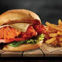 Buffalo Sandwich · Built on a toasted bun, with buffalo sauced tenders sitting on a bed of mixed greens, sliced...