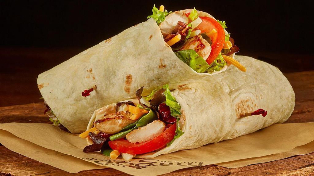 Magoo'S Wrap - Ala Carte · Your choice of tenders, built on a flour tortilla, filled with mixed greens, sliced tomatoes, cheddar-jack cheese, and our signature Magoo's sauce.