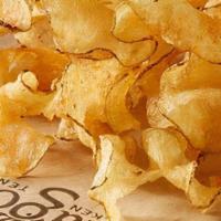 Fresh-Cut Chips · A hand-cut potato fried to perfection and lightly seasoned with Magoo's seasoning.