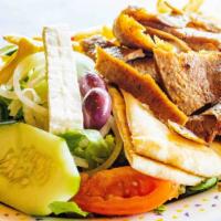 Gyro Plate · Slices of gyro meat, French fries, lettuce, tomatoes, onions, and peppers. Served with pita ...
