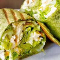 Chicken Caesar Wrap · Grilled chicken, Romaine lettuce, Parmesan cheese, Caesar dressing wrapped in a delicious fl...