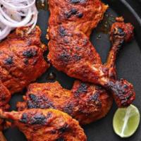 Chicken Tikka · Succulent cubes of marinated chicken breast grilled with seven spices in a clay oven.