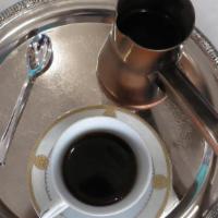 Turkish Coffee · Unfiltered coffee. Roasted and then finely ground coffee beans are simmered in a pot, and se...