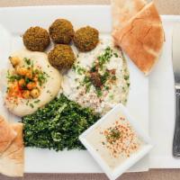Vegetarian Plate (V) · 4 Pieces of falafel served with any 3 sides of your choice, pita bread and tahini sauce.