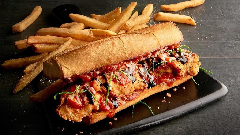 Mandrino’S Famous Chicken Parm Sub · A classic, only better, we batter and lightly fry chicken tenders, cover them in flavorful marinara sauce and our melted cheese blend, add some fresh basil, a drizzle of balsamic glaze and then serve it up on a toasted, garlic-buttered baguette with hot, seasoned fries.