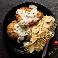You Gotta Chicken Piccata · Two lightly battered, lightly fried chicken breasts topped with an Alfredo and white wine an...