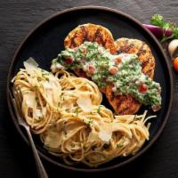 Chicken Tuscany · Two tender grilled chicken breasts seasoned the Italian way… with aromatic herbs, covered wi...