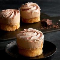 Tiramisu  · Three mini coffee-flavored sponge cakes dusted with cocoa. It’s the perfect ending to your m...