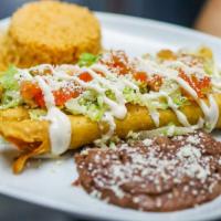 Flautas (3 Per Order) · Tight rolled tortilla deep fried and stuffed with shredded beef or chicken topped with our h...