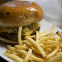 Cheeseburger · Homestyle burger 100% beef topped with Mexican cheese on a fresh brioche served with French ...