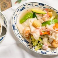 Seafood Delight · Shrimp, scallops, crabmeat, and vegetable stir fried with light white sauce.