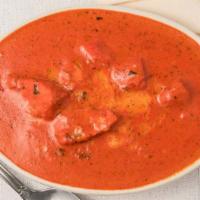 Butter Chicken · Boneless tandoori chicken simmered in a creamy tomato sauce.
