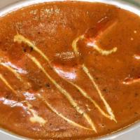 Chicken Tikka Masala - Served With Basmati Rice · (Chefs Specialty)
Boneless grilled chicken cooked with tomato, cream, and special spices. A ...