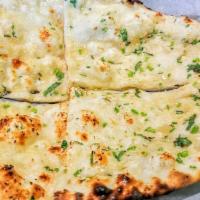 Garlic Naan · Butter naan infused with garlic and cilantro.