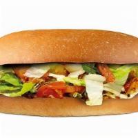 Buffalo Chicken Sandwich · Smoked Chicken tossed in Buffalo sauce then topped with melted Mozzarella, lettuce and tomat...