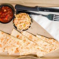 Traditional · Grilled flour tortilla stuffed with our Mexican three cheese blend. Add protein for an addit...