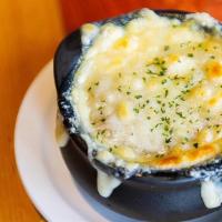 French Onion Soup · French-Style Onion Soup, a Homemade Crouton,
and Tillamook® Melted Swiss