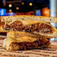 The Patty Melt · Tillamook® Swiss Cheese, Caramelized Onions,
and Thousand Island Dressing on Toasted Rye Bread