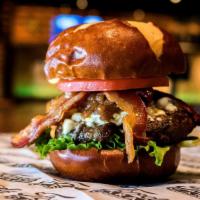 The Black-N-Bleu · Half pound of grilled black angus, crumbled bleu cheese, applewood smoked bacon, caramelized...