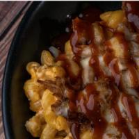 Pulled Pork Mac N'Cheese · Bourbon bbq pulled pork and cavatappi pasta, tossed in our ford's beer cheese blend, topped ...