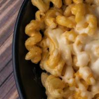 Shrimp Mac N'Cheese · Shrimp and cavatappi pasta, tossed in our ford's beer cheese blend, topped with a shredded M...