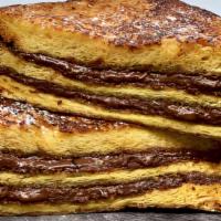 Nutella® French Toast · Our Original French Toast, grilled then layered throughout with Nutella and dusted with Powd...