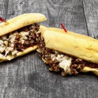 Philly Cheese Steak · Sliced Roast Beef seasoned and Grilled with Onions and Melted Provolone Cheese