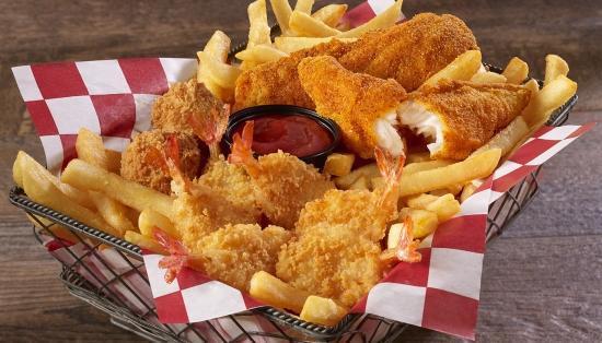 2 Pc Catfish, Butterfly Shrimp & Fries · A delicious sampling of our hand-breaded Catfish & butterfly Shrimp. Two southern-style catfish fillets paired with six crispy butterfly shrimp, served with fries & two hush puppies.
