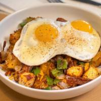 Loaded Homefry Bowl · Home fries topped with onions, peppers, cheddar cheese, two eggs and your choice of bacon or...