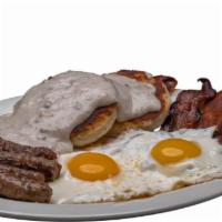 Homestead Platter · Two eggs, four slices of bacon, four pieces of sausage and a biscuit with a side of sausage ...