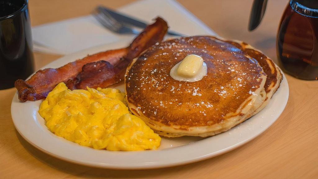 Three Little Deuces · Two buttermilk pancakes, two eggs and choice of bacon or sausage.