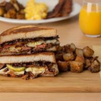 The Big Smoky Melt · Chopped smoked pork, bacon, pickles,. Swiss cheese, and bacon jam on a. thick-sliced grilled...