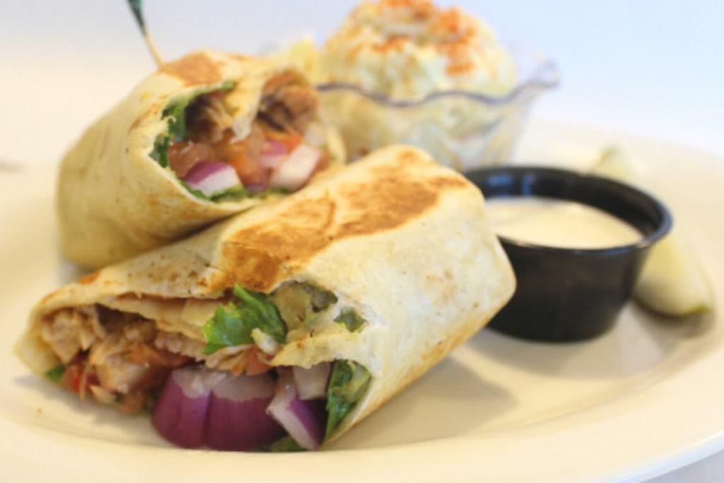 Grilled Chicken Wrap · Grilled chicken breast with lettuce, tomato, avocado, red onion and ranch dressing on the side.