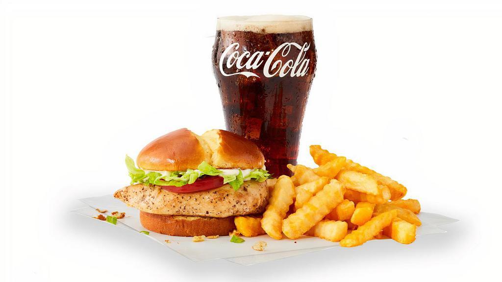 Grilled Chicken Sandwich Combo · Fresh, never frozen grilled chicken fillet. Topped with tomato, lettuce, and mayo. Served with your choice of side and a drink.